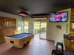 clubhouse-entrance-and-pool-table
